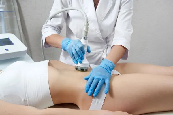 Lost the Weight but Not the Loose Skin? 2 woman having HIFU treatment on her stomach to combat loose skin Sale following weight loss